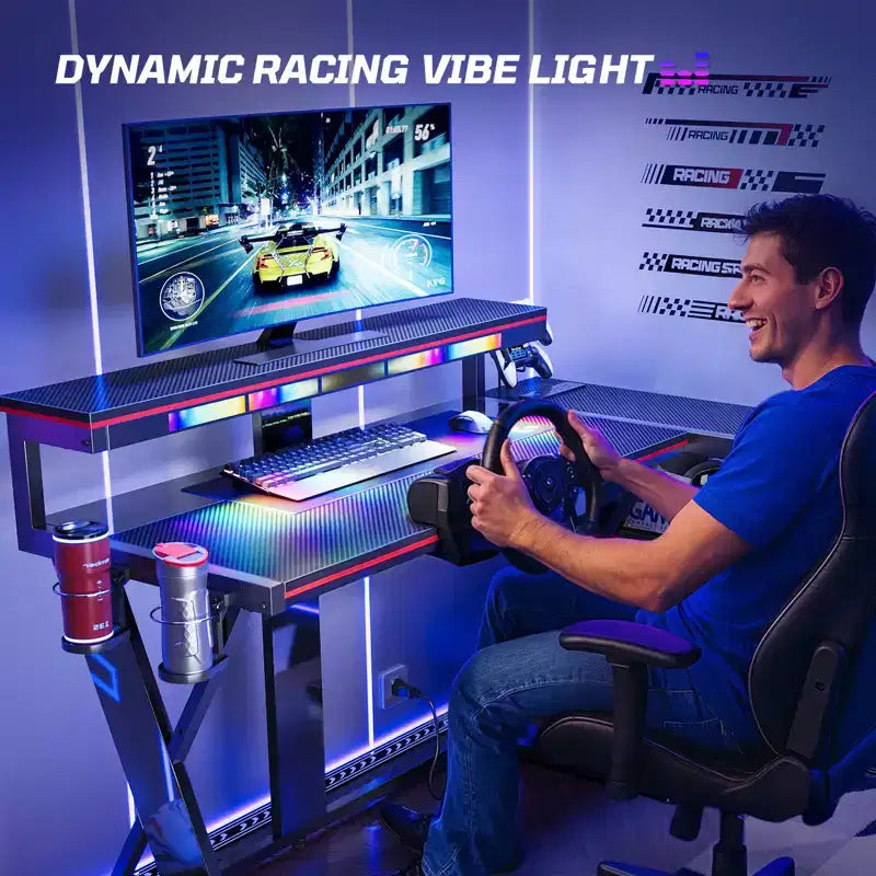 Bestier Bureau Gamer en Forme de L de 105,6 cm/144,8 cm avec Support Moniteur et Prise de Courant, Bureau d'Angle d'Ordinateur LED avec Porte-Gobelet et Support Manette
