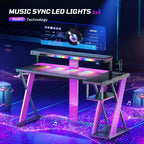 Bestier Bureau Gamer en Forme de L de 105,6 cm/144,8 cm avec Support Moniteur et Prise de Courant, Bureau d'Angle d'Ordinateur LED avec Porte-Gobelet et Support Manette