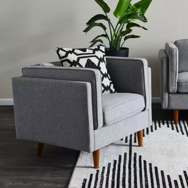 Fauteuil Atley moderne rembourré à accoudoirs hauts avec pieds en bois massif