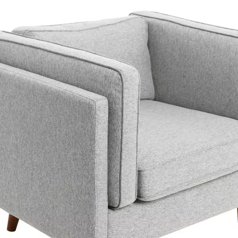 Fauteuil Atley moderne rembourré à accoudoirs hauts avec pieds en bois massif