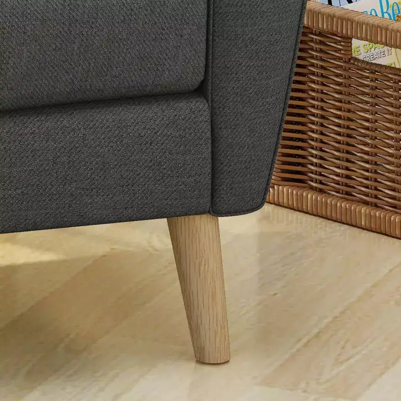 Fauteuil club capitonné en tissu avec passepoil Angelina Mid-Century GDFStudio