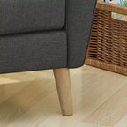 Fauteuil club capitonné en tissu avec passepoil Angelina Mid-Century GDFStudio