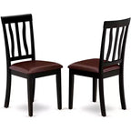 HomeStock Belmont, Ensemble de salle à manger ovale 7 pièces avec table à piédestal et chaises sans accoudoirs, Noir