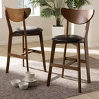 Lot de 2 tabourets de bar à hauteur de comptoir Baxton Studio Eline en bois de noyer et similicuir, noir : dossier ovale, nettoyer les taches